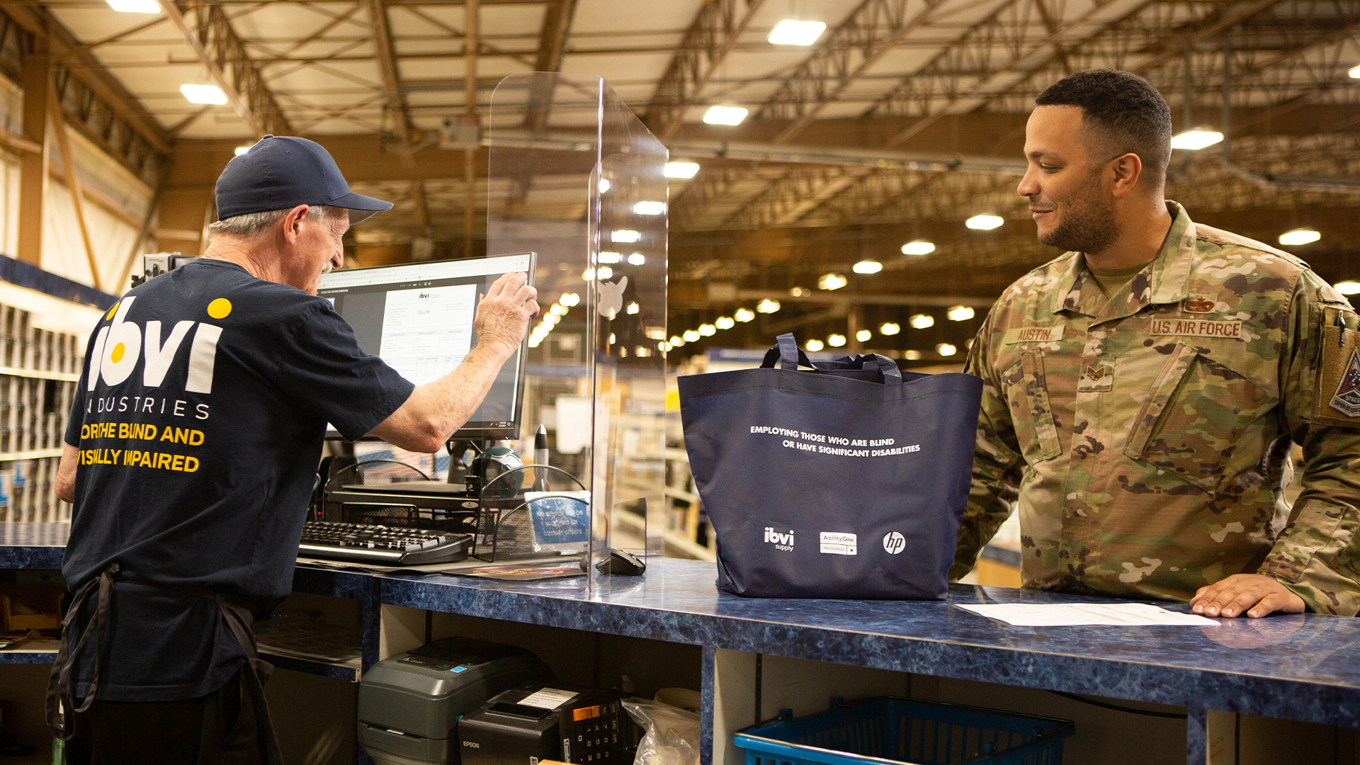 US Air Force getting a bag from an IBVI employee