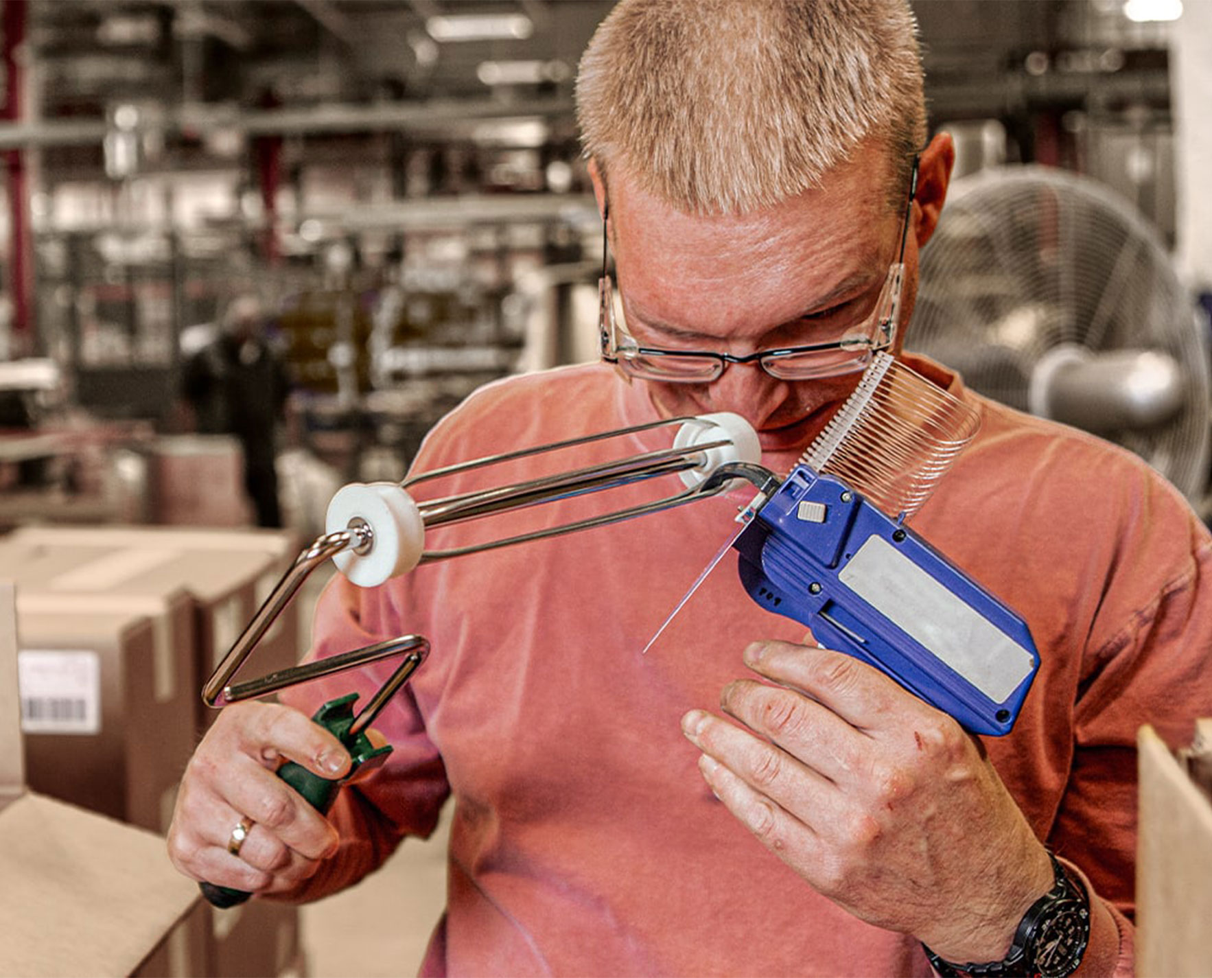 man assembling a paint roller